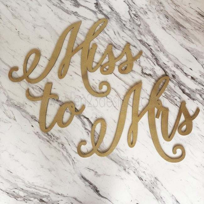 Wooden "Miss to Mrs" sign