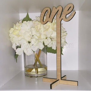 Written Table Numbers on a Stand