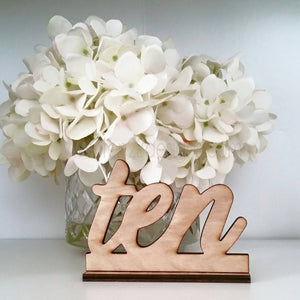 Written Table Numbers on a Tabletop Base